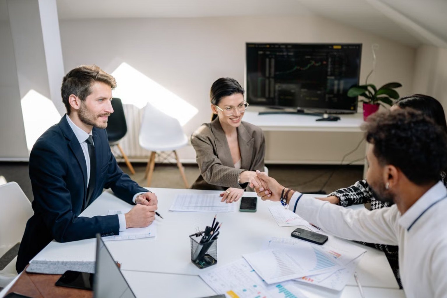 Closing a company setup meeting with a handshake